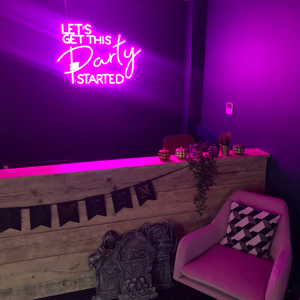 Custom neon signage installation for a venue