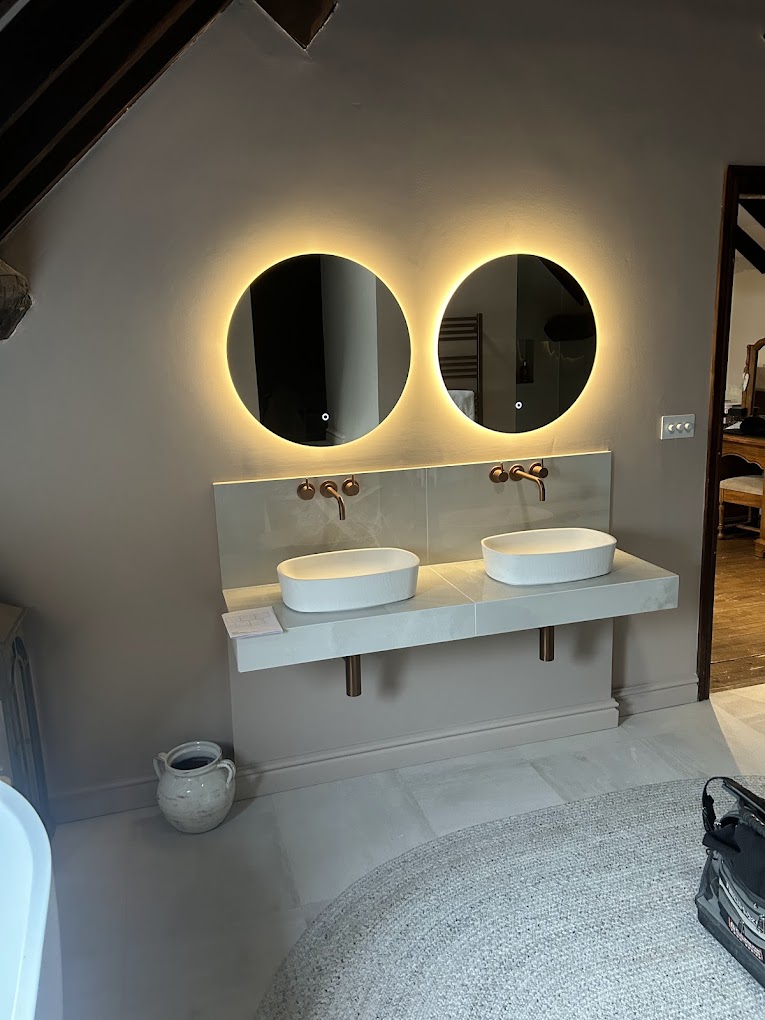 Twin round backlit bathroom mirrors