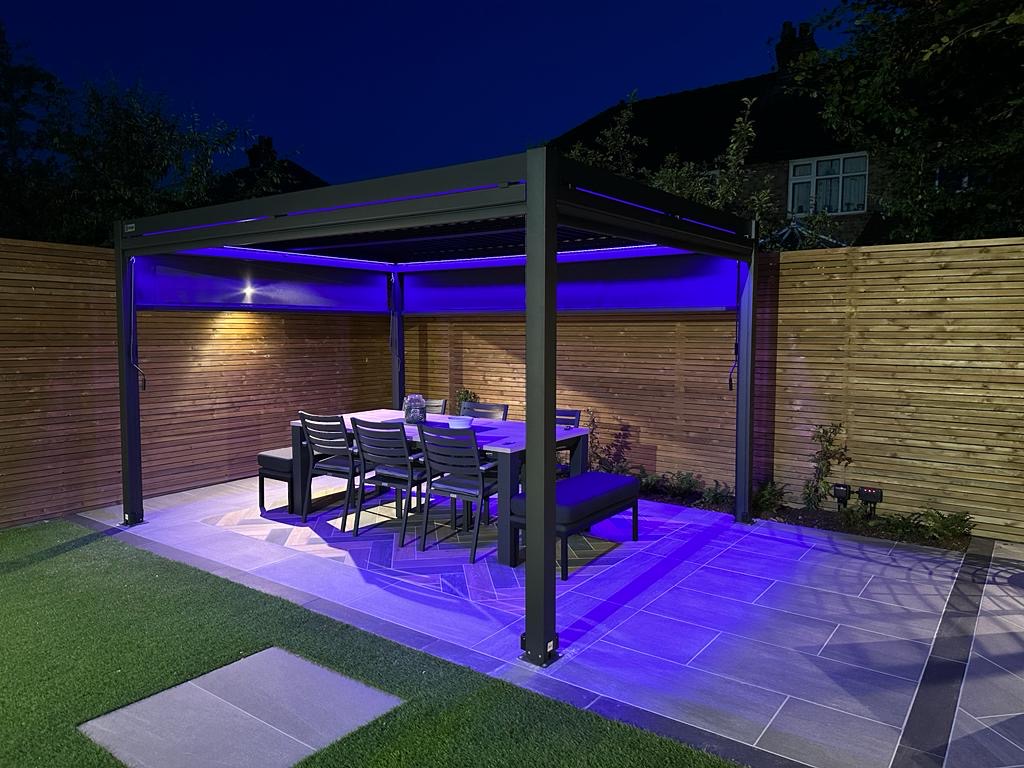 Outdoor pergola with colour-changing LED strips