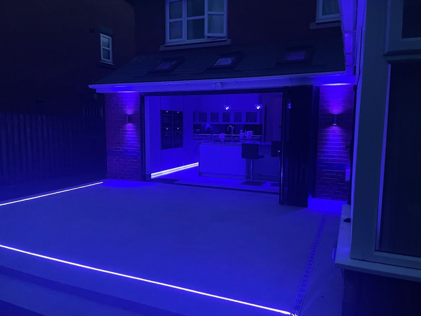 External LED strip lighting on patio and steps